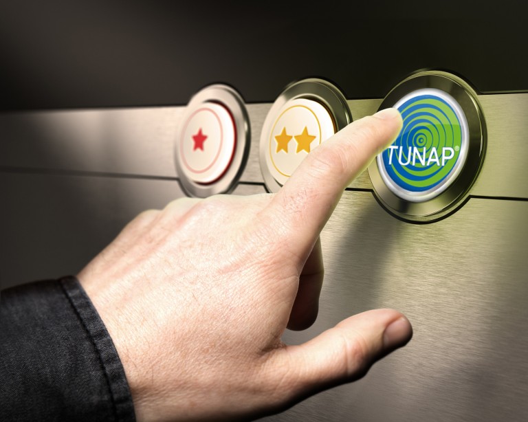 TUNAP-lösningar Hand pekar på en knapp med texten TUNAP